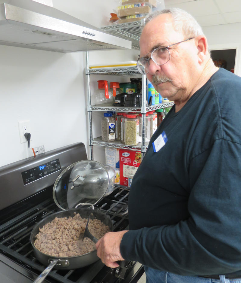 Mike Smith at the stove