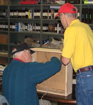 Ray McClure with Duane Darling working on the turntable base at APN