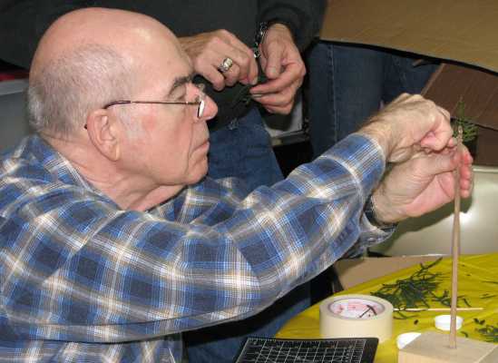 Robert Miller making trees during a work session at APN