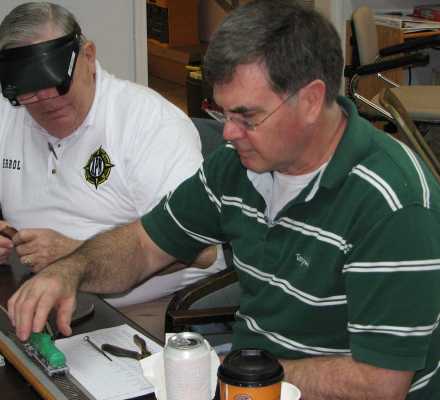 David Tumulty checking a tank car at an APN work session